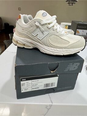 New Balance Kids 2002R Sneakers in Grey and White with Subtle Tan Accents